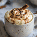keto cinnamon roll mug cake in a rustic mug