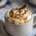 keto cinnamon roll mug cake in a rustic mug