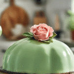 Swedish princess cake with marzipan dome and rose